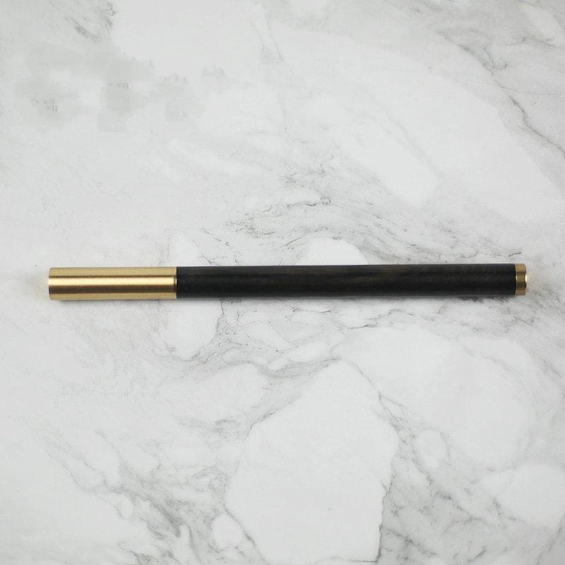 złoty długopis z drewnem